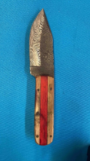 Handmade Damascus steel knives with either custom wood, bone, or resin handles