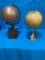 Two decorative globes