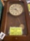 Howard miller clock Goodyear retirement pin at bottom , 14 k gold ruby and diamond in pin