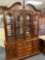 Lexington two piece trying to cabinet with glass shelves 60 inches wide 84 inches tall