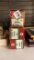 three boxes of toy train tracks