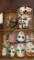 three flats of decorative wall hanging masks, 3 are metal enameled masks