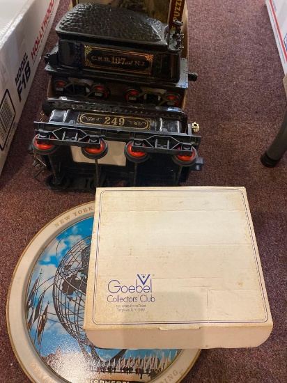 tin trays, ceramic train cars, goebel nun, old puzzle