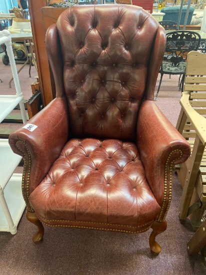 high back vinyl chair , nailhead accents