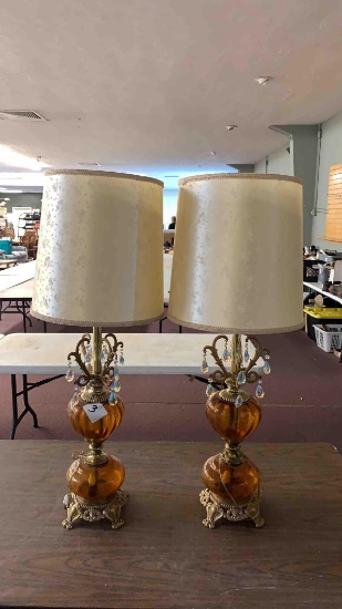 Pair of vintage amber colored lamps with prisms