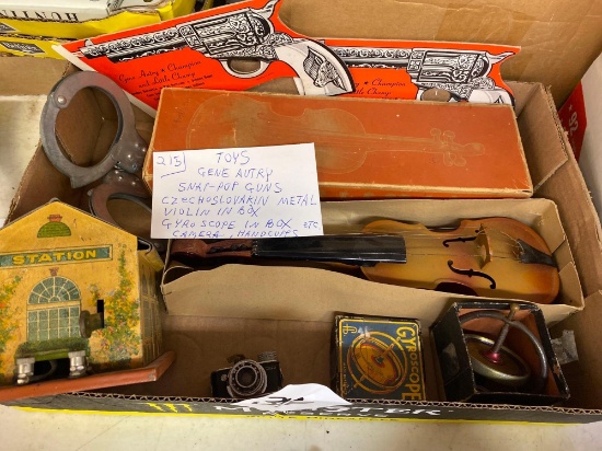 toys gene autry snap pop guns, Czechoslovakian metal violin in box , gyro scope in box etc camera