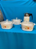 Four pieces of Corningware