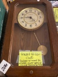 Howard miller clock Goodyear retirement pin at bottom , 14 k gold ruby and diamond in pin