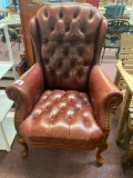 high back vinyl chair , nailhead accents