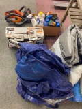 tarps , cleaners , hedge trimmers