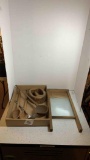 Vintage cooking utensils and a wash board