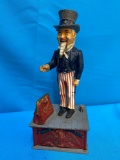 Uncle Sam mechanical bank cast iron book of knowledge