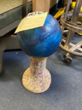 bowling ball lawn ornament on decorative ceramic base 20 inches tall