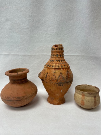 Antique middle eastern clay pottery artifacts