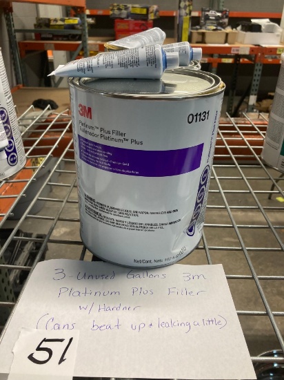 three unused gallons 3M platinum plus filler with Hardner cans beat up and leaking a little