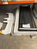 three soft tri, fold tonneau covers and a cab visor