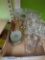 golden pedestal clear glass bowl with chandelier hanging glass, two clear glass candle sticks and
