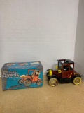 Battery operated Grandpas classic car with shaking action and protruding engine