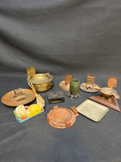 Antique ashtrays, matchbook and match stick holders