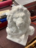 cement lion approximately 18 inches tall
