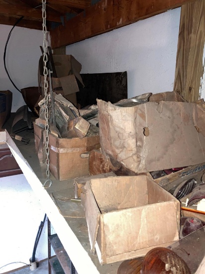 contents of upper shelves bring ladder and help to remove mostly old car parts