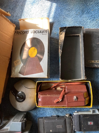 Collection of vintage cameras record vacuum