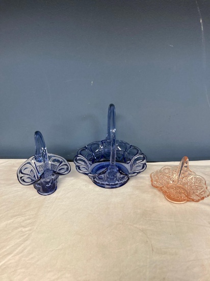 2 Fenton blue glass baskets and possibly LE Smith pink glass basket