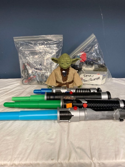 Interactive Yoda with lightsaber plus 3 lightsabers and flick truck bikes and semi transformer