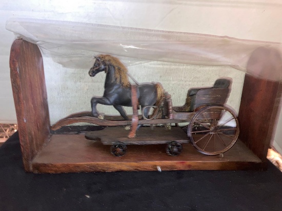 Iron and wood horse and carriage