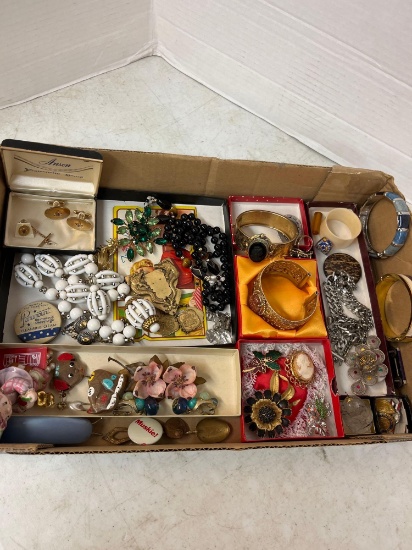 Flat of costume jewelry
