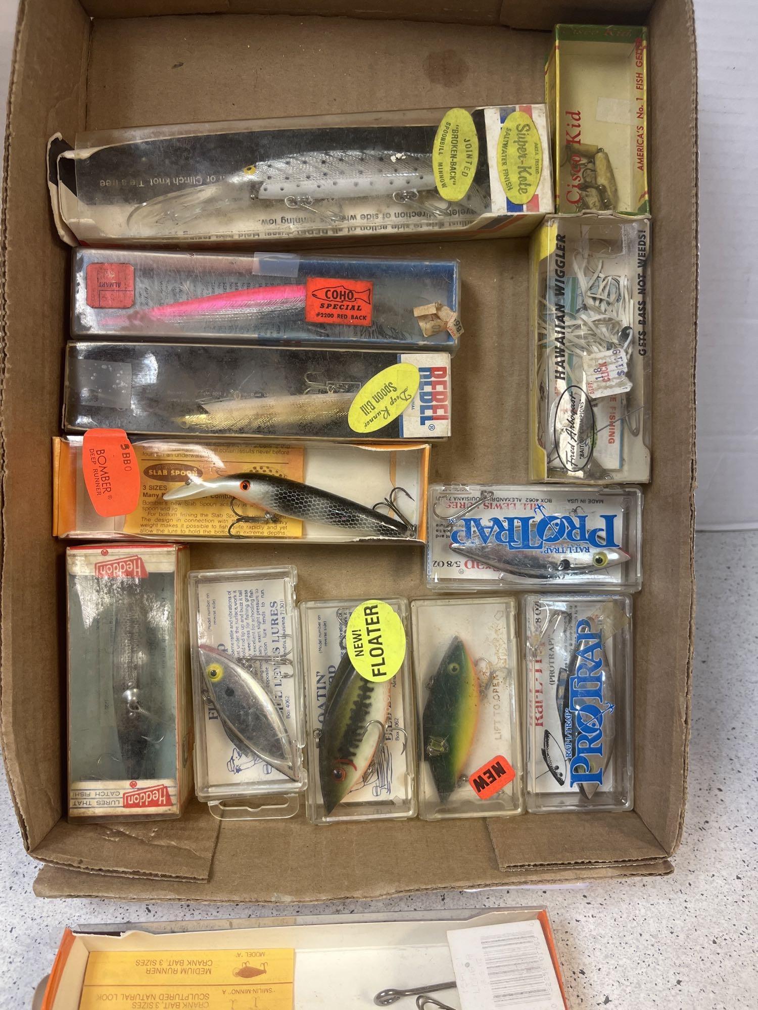 Flat of fishing lures in boxes