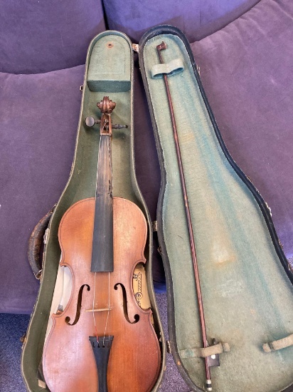 antique violin with bow in case