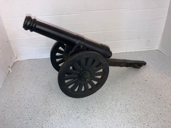 heavy cast-iron Cannon back un screws about 17 inches long