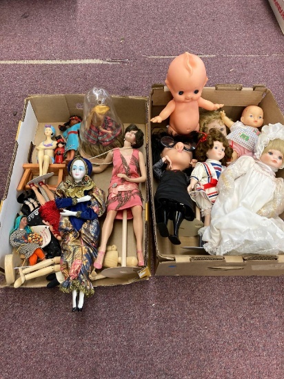 Two flats of dolls