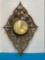 Mid century Syroco clock has section with crack