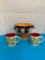 Halloween compote and two Starbucks Christmas mugs