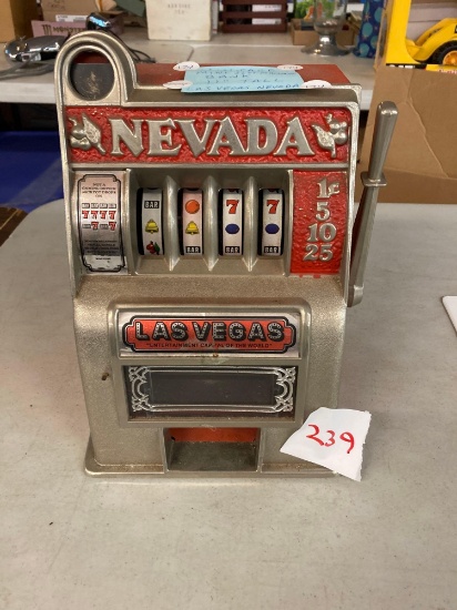 Vintage cast aluminum mini slot machine bank