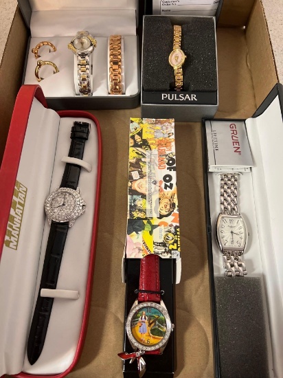 5 watches in boxes