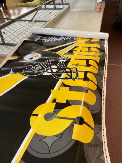 Sports banners Saints Rams Raiders Steelers