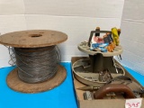 Spool of wire tools bucket gun rack