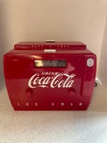 Red plastic Coca Cola radio in shape of a cooler