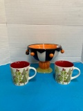 Halloween compote and two Starbucks Christmas mugs