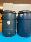 Plastic barrels with locking lid latches