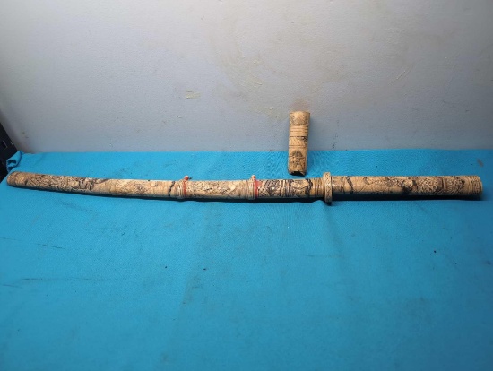 Carved bone Japanese samurai sword