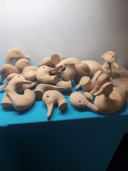25 Carved wood decoy heads 2 decoys