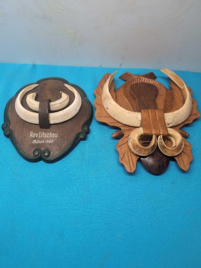 2 Boar Tusk wooden plaques