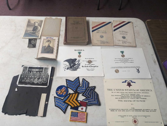 WW II and Korean War papers patches photos