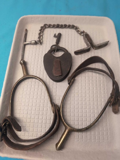 Antique spurs wrist twister lock and key