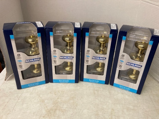 4 Schlage brass finish door knobs