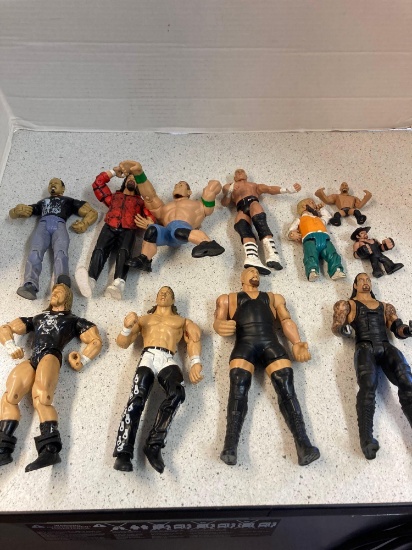11 wrestling figurines